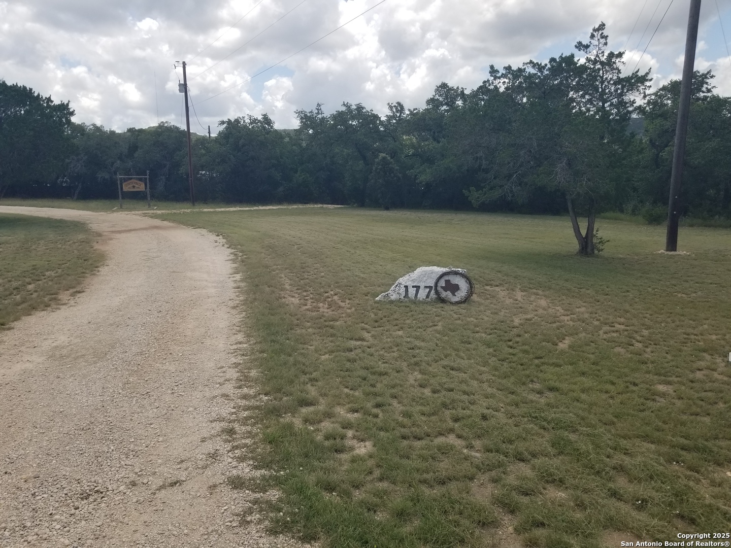 177 Laurel Ridge Drive Lakehills, TX 78063 - Photo 7 of 51 a view of a water fountain and a yard