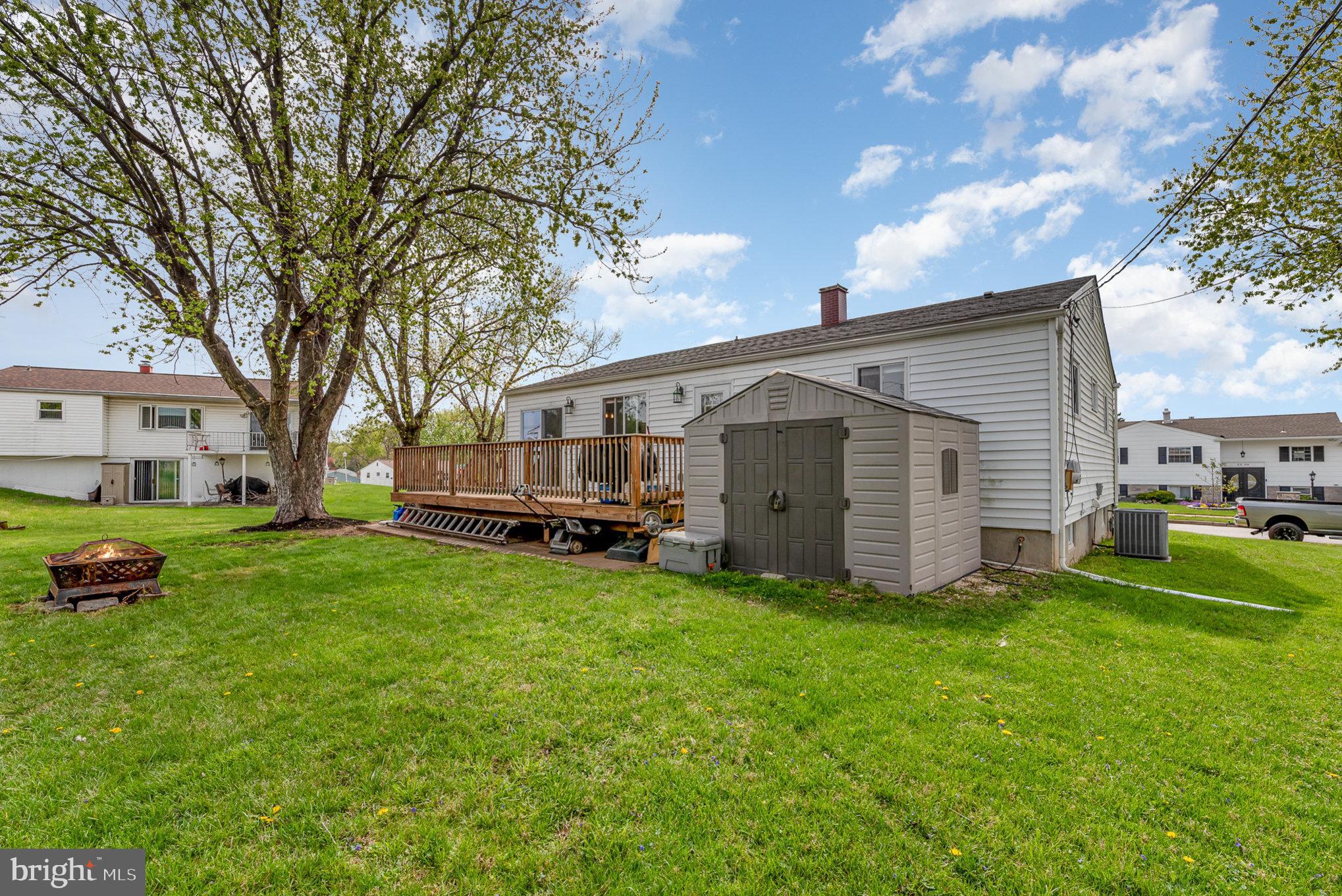 2303 Hamiltowne Circle Rosedale, MD 21237 - Photo 24 of 26 a view of a house with a yard and sitting area