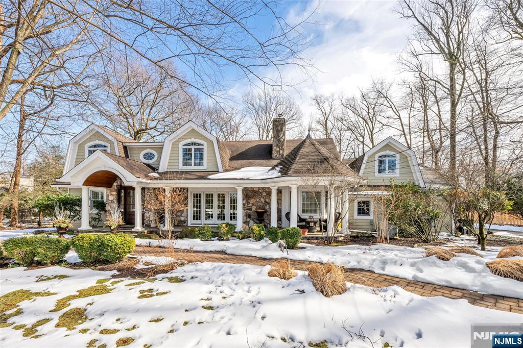 a front view of a building with a yard