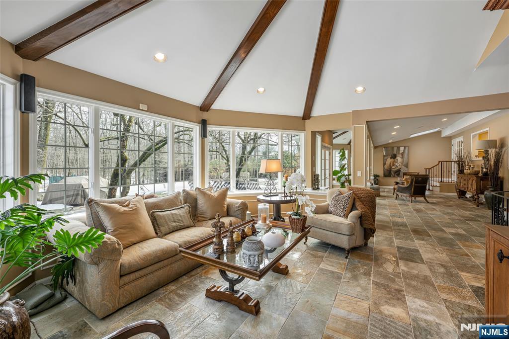 8 White Pine Road Upper Saddle River, NJ 07458 - Photo 13 of 50 a living room with furniture and a large window