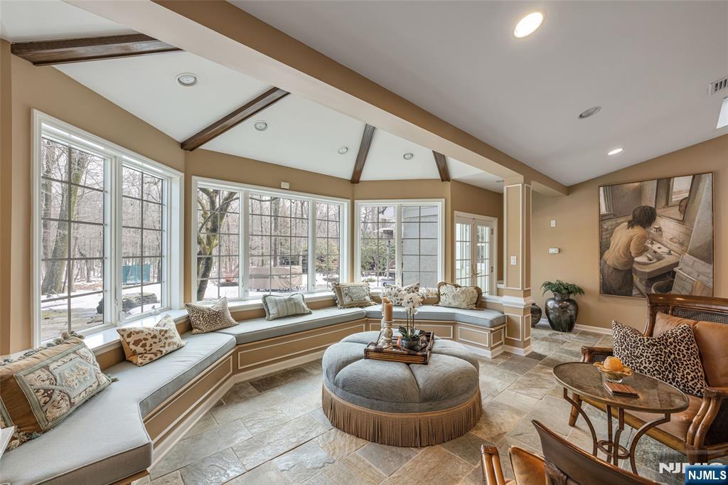 8 White Pine Road Upper Saddle River, NJ 07458 - Photo 17 of 50 a living room with furniture and a large window