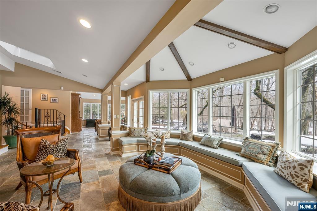 8 White Pine Road Upper Saddle River, NJ 07458 - Photo 18 of 50 a living room with furniture and a large window