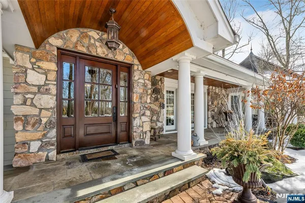 a living room with furniture a window and dining area