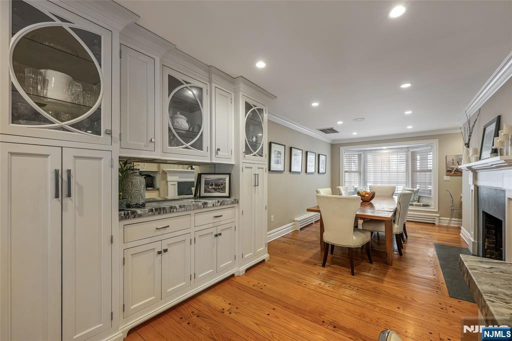 8 White Pine Road Upper Saddle River, NJ 07458 - Photo 21 of 50 a living room with furniture and a fireplace