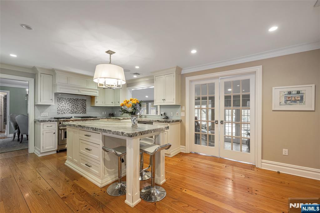 8 White Pine Road Upper Saddle River, NJ 07458 - Photo 24 of 50 a kitchen with a sink cabinets and wooden floor