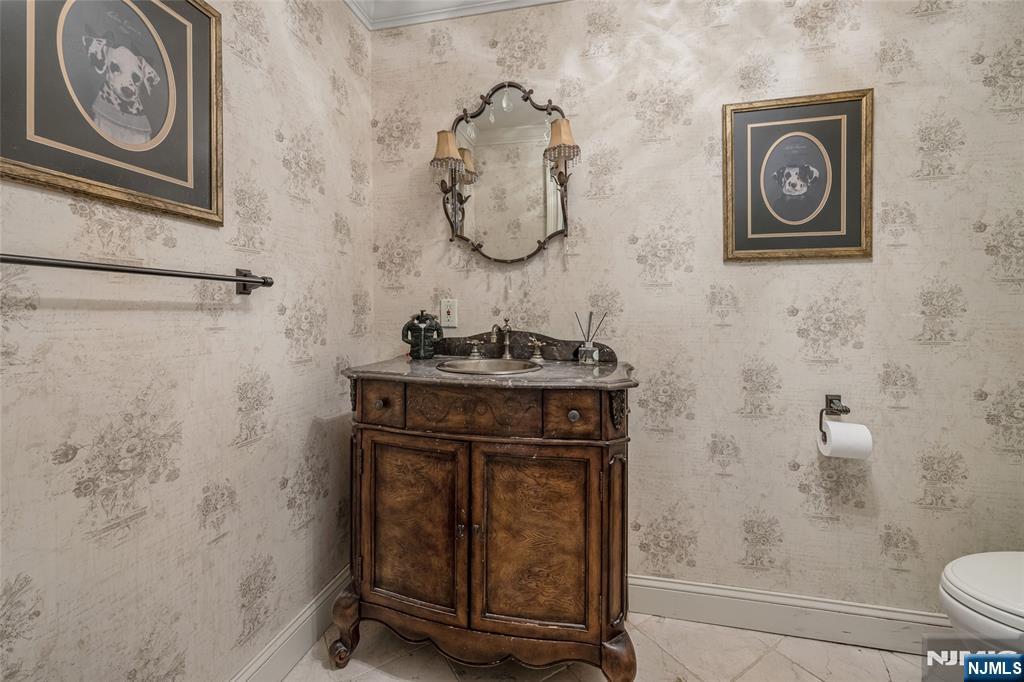 8 White Pine Road Upper Saddle River, NJ 07458 - Photo 29 of 50 a bathroom with a toilet and a sink