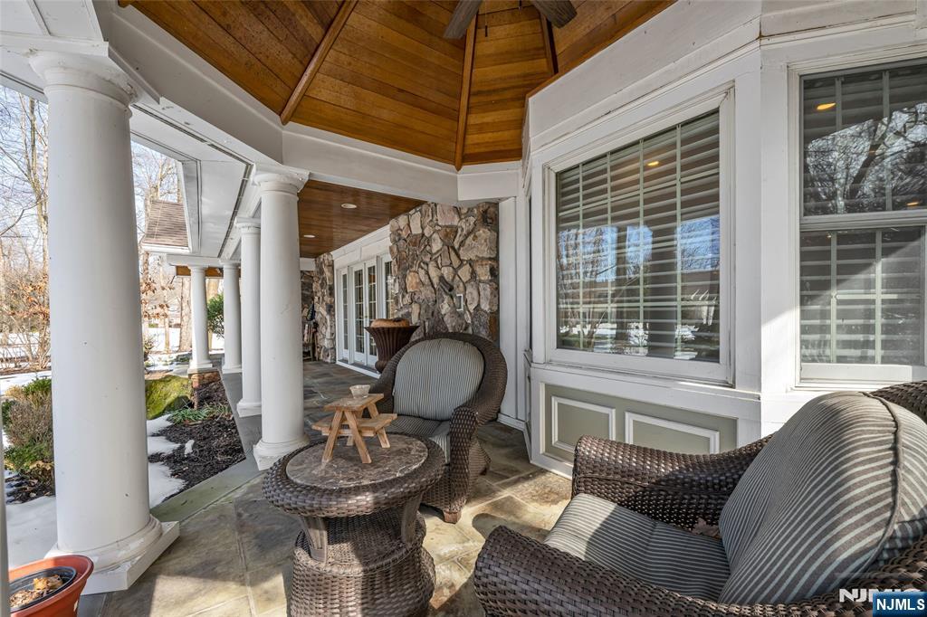 8 White Pine Road Upper Saddle River, NJ 07458 - Photo 3 of 50 a living room with furniture a window and dining area