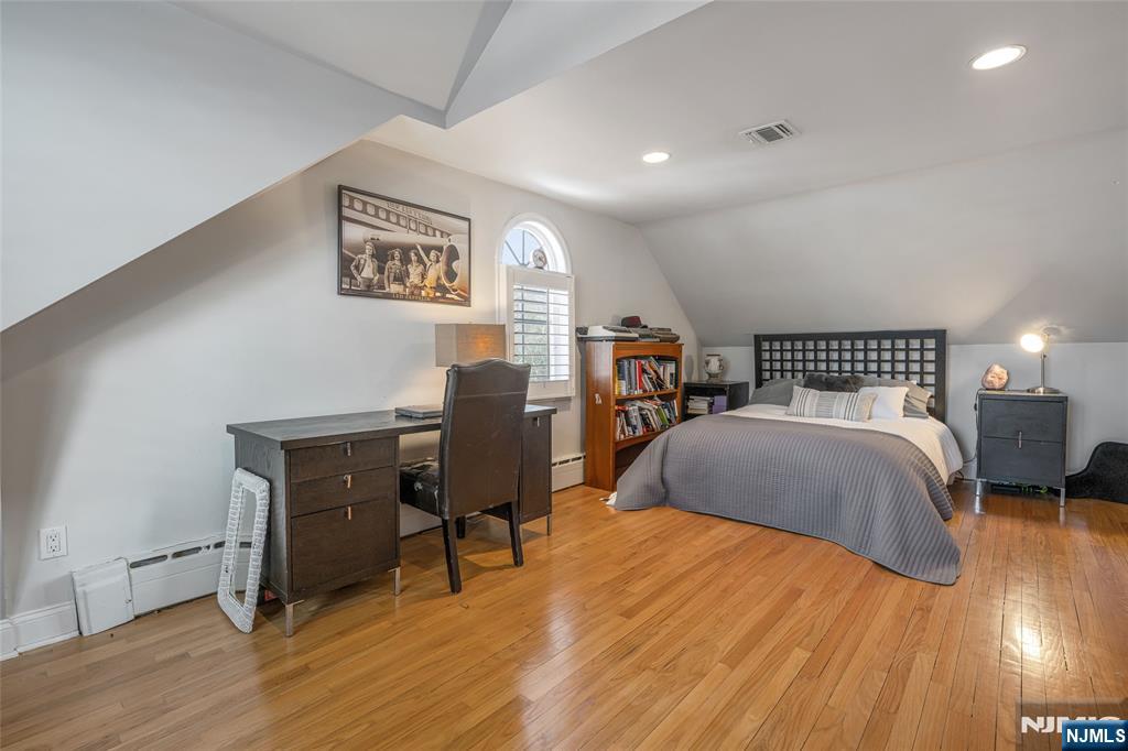 8 White Pine Road Upper Saddle River, NJ 07458 - Photo 31 of 50 a bedroom with a bed and a desk