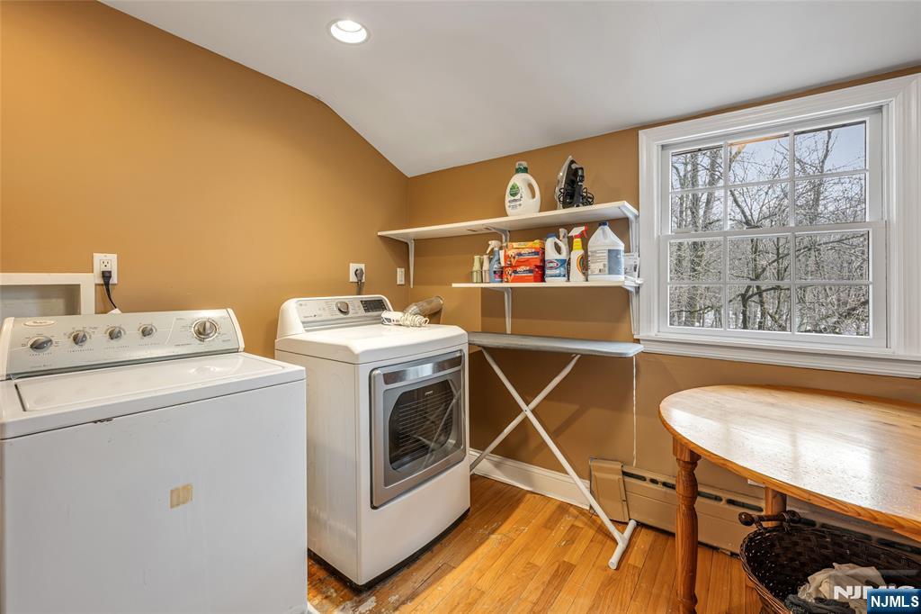 8 White Pine Road Upper Saddle River, NJ 07458 - Photo 36 of 50 a utility room with dryer and washer