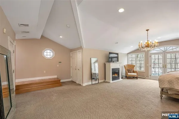 a bathroom with a bathtub a shower and a sink