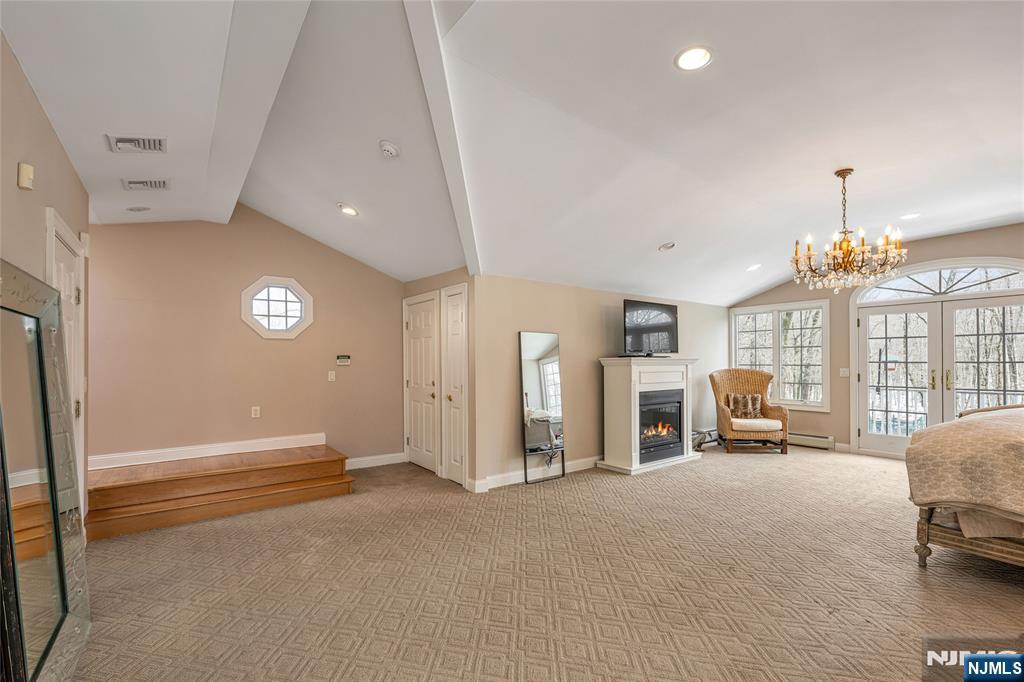 8 White Pine Road Upper Saddle River, NJ 07458 - Photo 39 of 50 a view of a livingroom with furniture and a large window