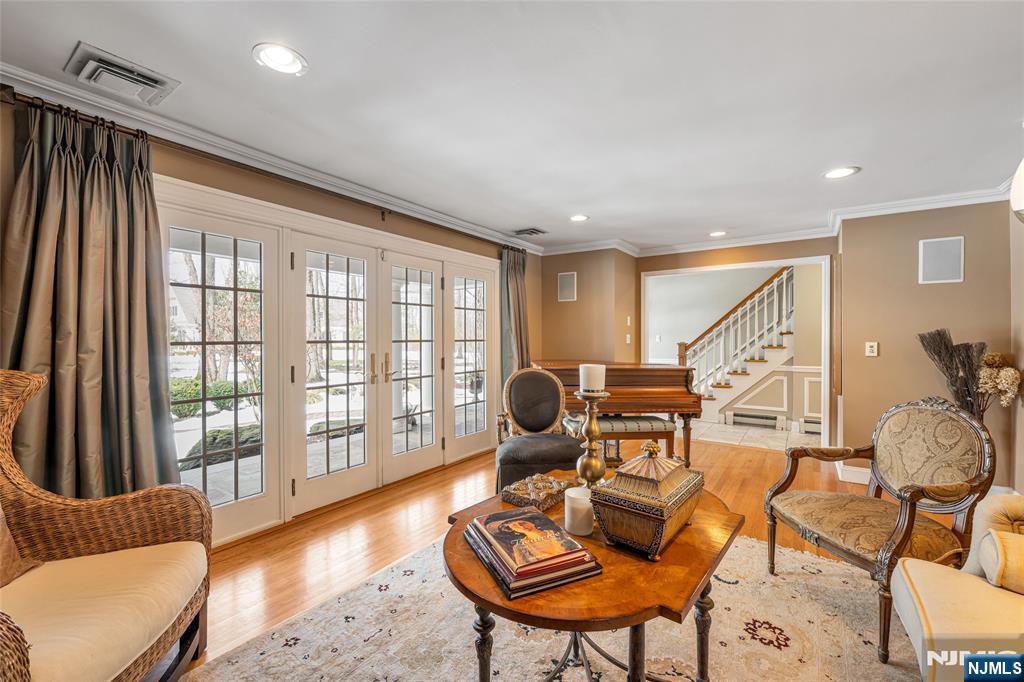 8 White Pine Road Upper Saddle River, NJ 07458 - Photo 7 of 50 a living room with furniture and a floor to ceiling window