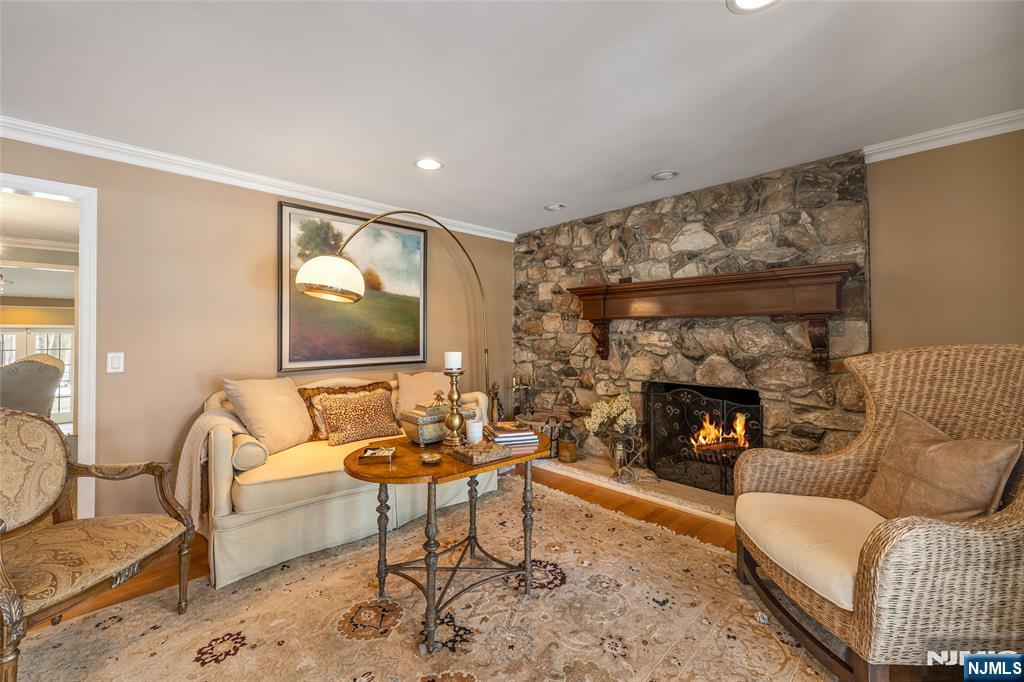 8 White Pine Road Upper Saddle River, NJ 07458 - Photo 8 of 50 a living room with furniture and a fireplace