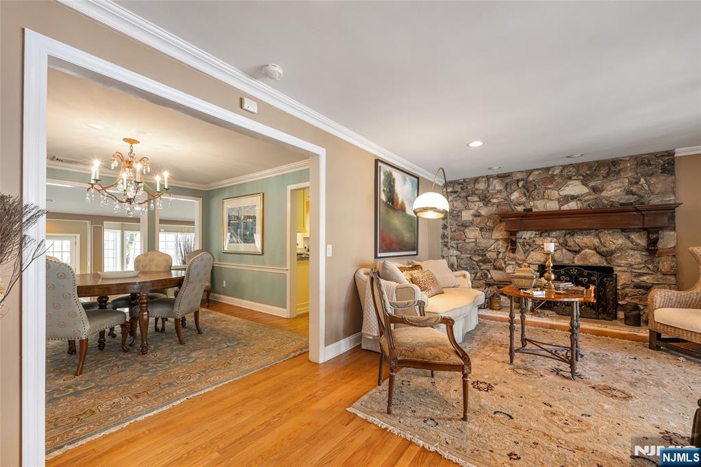 8 White Pine Road Upper Saddle River, NJ 07458 - Photo 9 of 50 a view of a livingroom with furniture window and wooden floor
