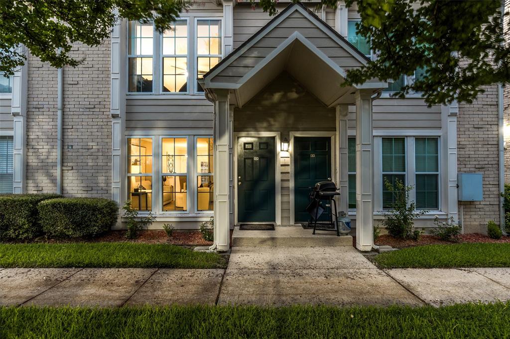 5881 Preston View Boulevard, Unit 159 Dallas, TX 75240 - Photo 11 of 12 a front view of a house with a yard