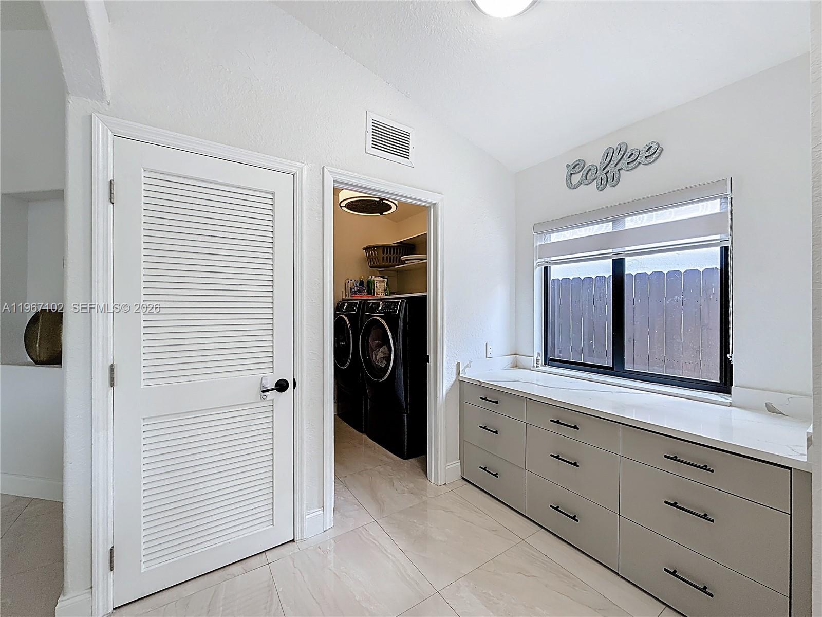 21102 Southwest 92nd Court Cutler Bay, FL 33189 - Photo 12 of 40 a bathroom with a shower and a sink