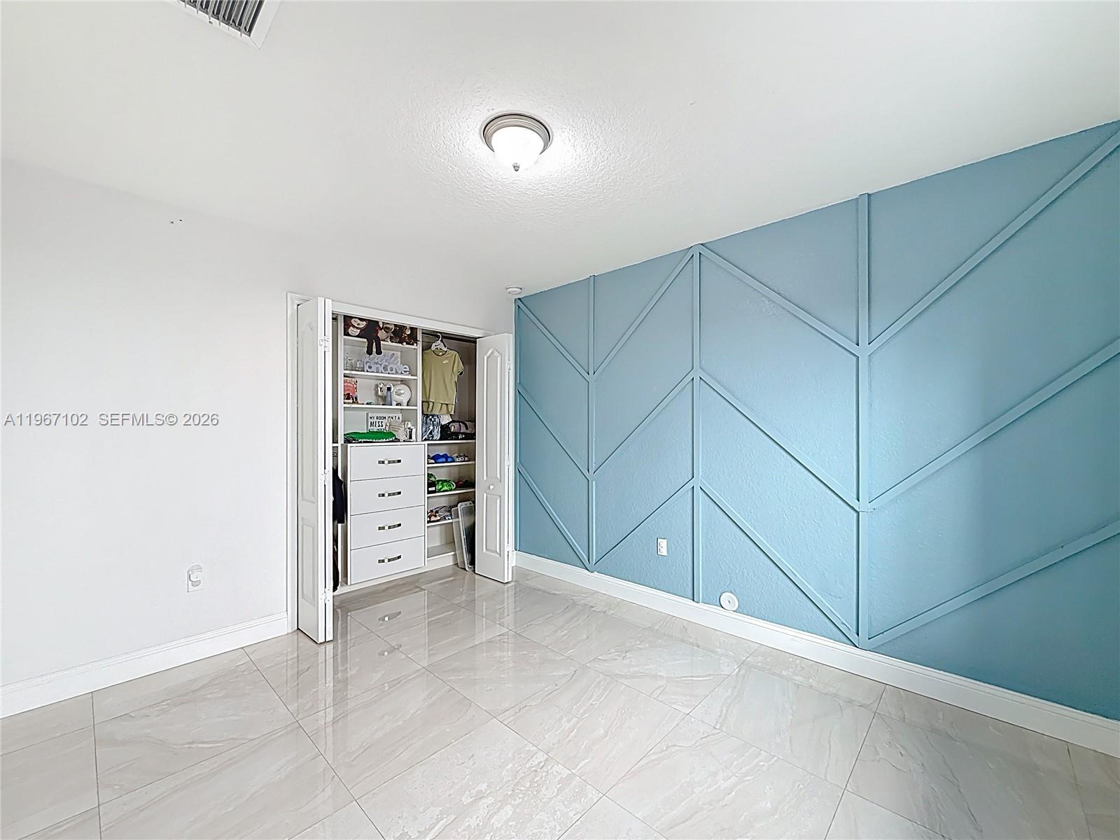 21102 Southwest 92nd Court Cutler Bay, FL 33189 - Photo 19 of 40 a view of a livingroom with an empty space