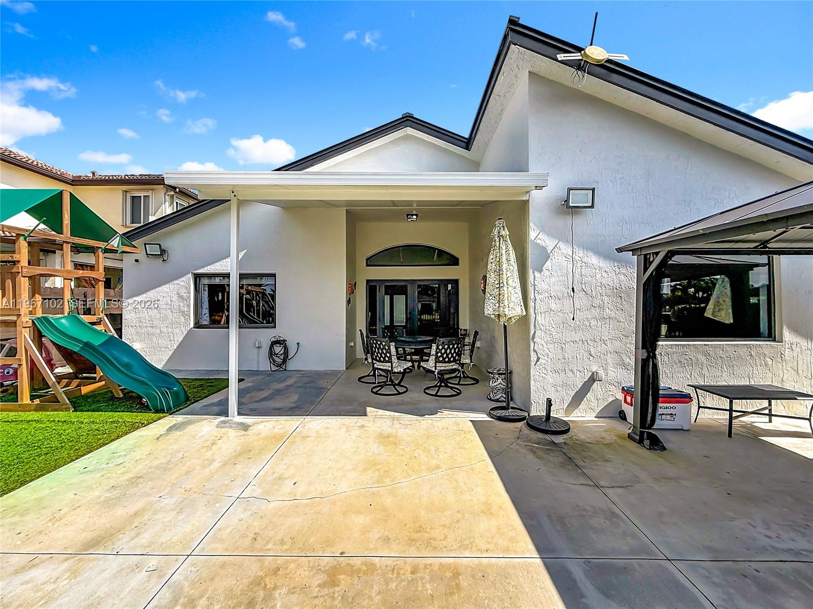 21102 Southwest 92nd Court Cutler Bay, FL 33189 - Photo 32 of 40 a view of a house with outdoor space