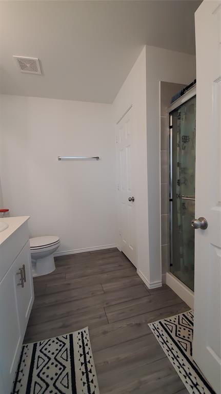 1653 Box Elder Road Forney, TX 75126 - Photo 19 of 21 a bathroom with a sink and a toilet