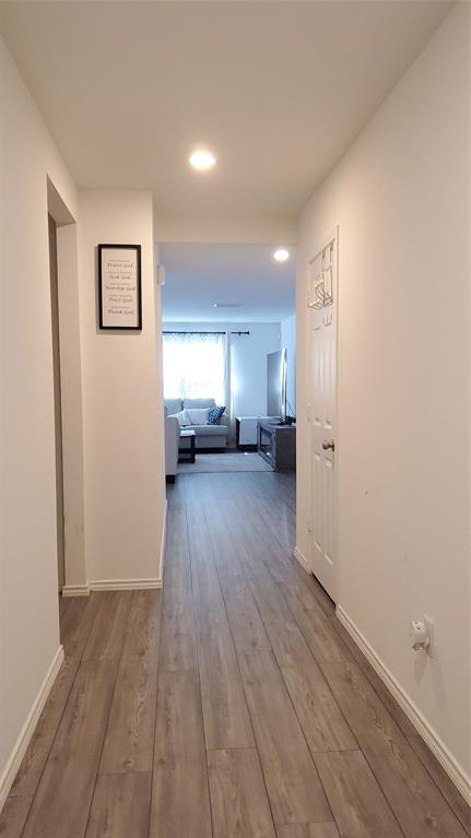 1653 Box Elder Road Forney, TX 75126 - Photo 4 of 21 a view of a big room with wooden floor and windows