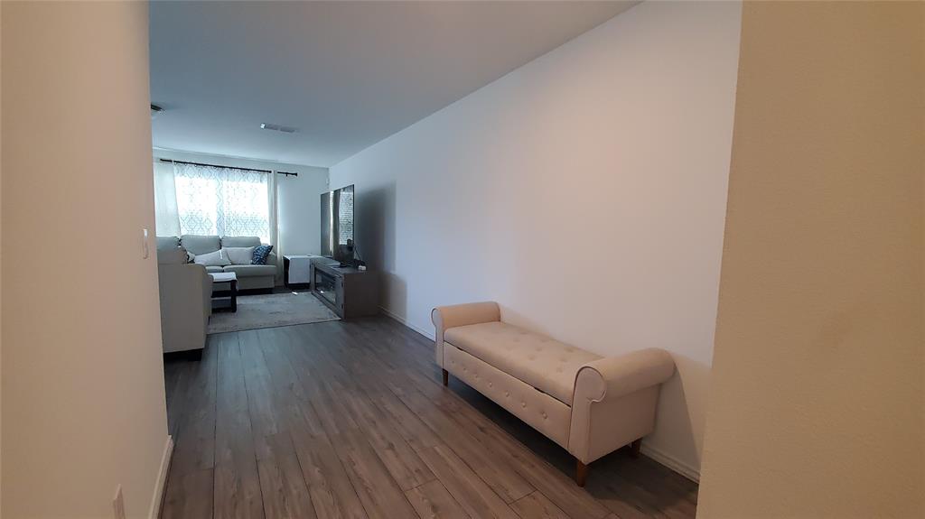 1653 Box Elder Road Forney, TX 75126 - Photo 6 of 21 a living room with furniture and a couch