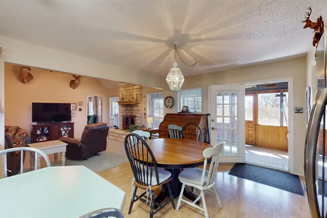 a room with a table and chairs