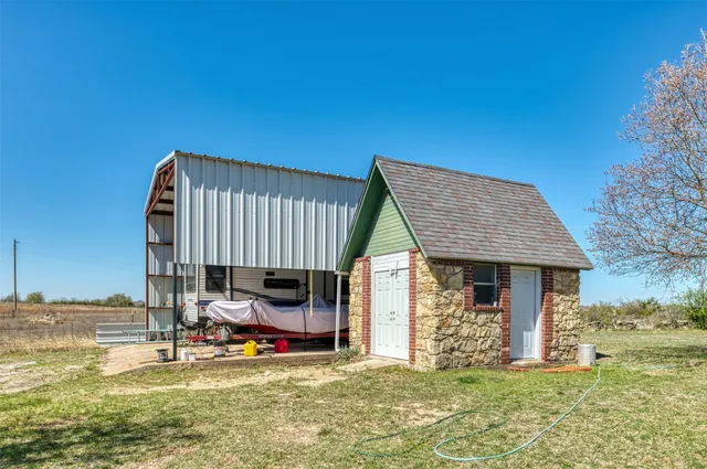 a view of sitting area in front of house