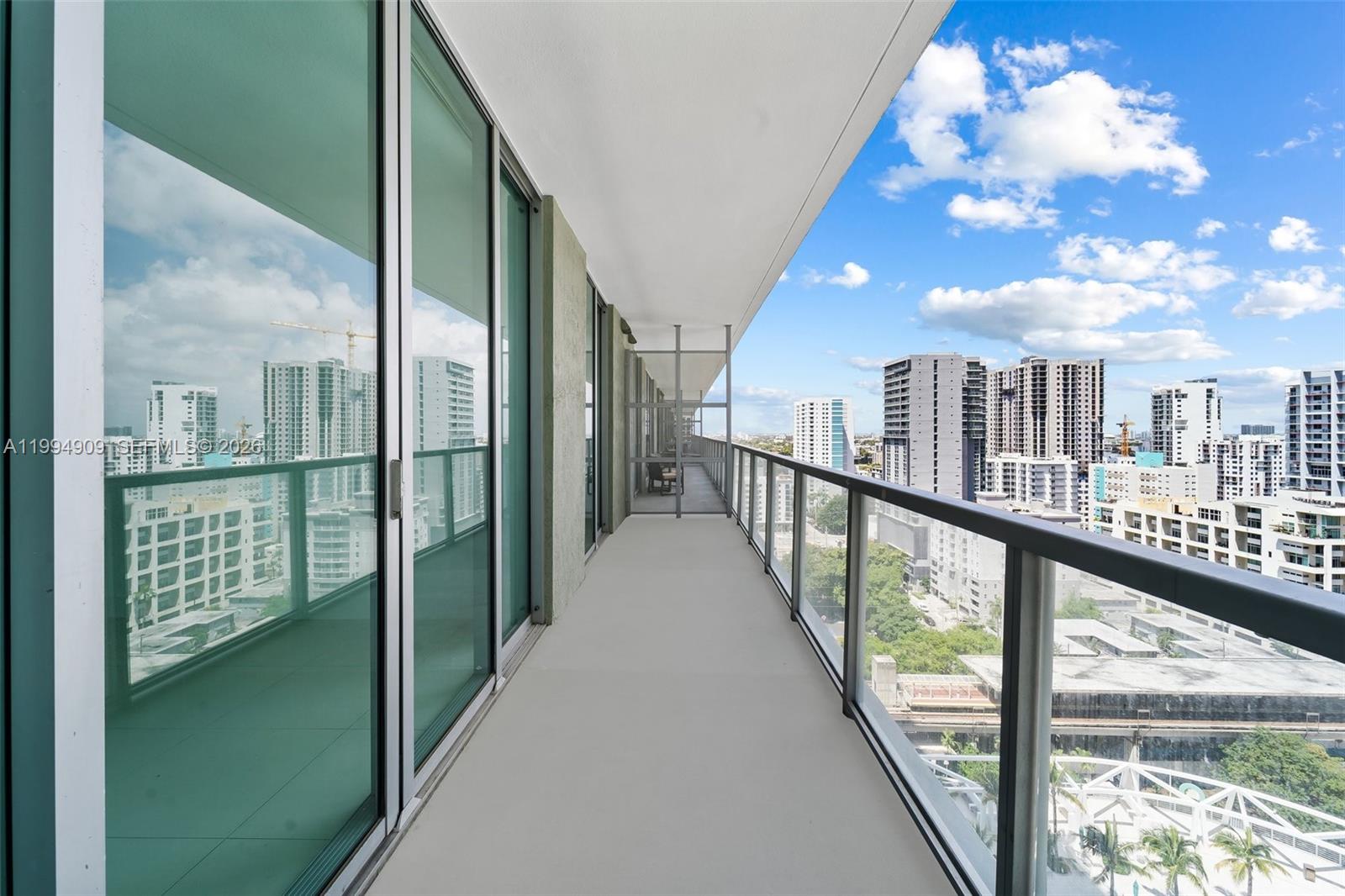 79 Southwest 12th Street, Unit 2108S Miami, FL 33130 - Photo 8 of 16 a view of city from a balcony