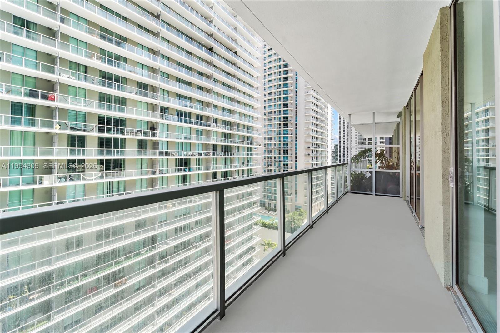 79 Southwest 12th Street, Unit 2108S Miami, FL 33130 - Photo 9 of 16 a view of balcony with stairs