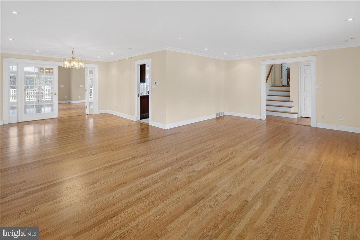 328 Dodds Lane Princeton, NJ 08540 - Photo 14 of 47 a view of an empty room with wooden floor and a window