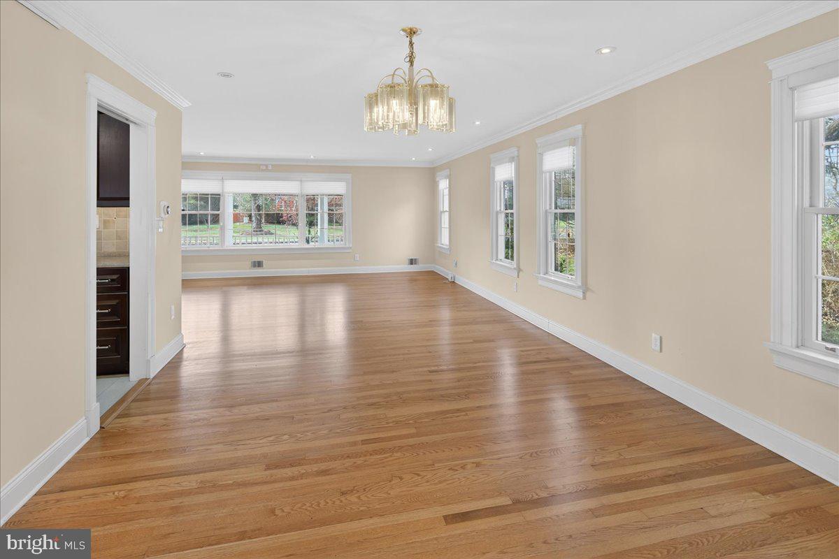 328 Dodds Lane Princeton, NJ 08540 - Photo 17 of 47 wooden floor in an empty room with a window