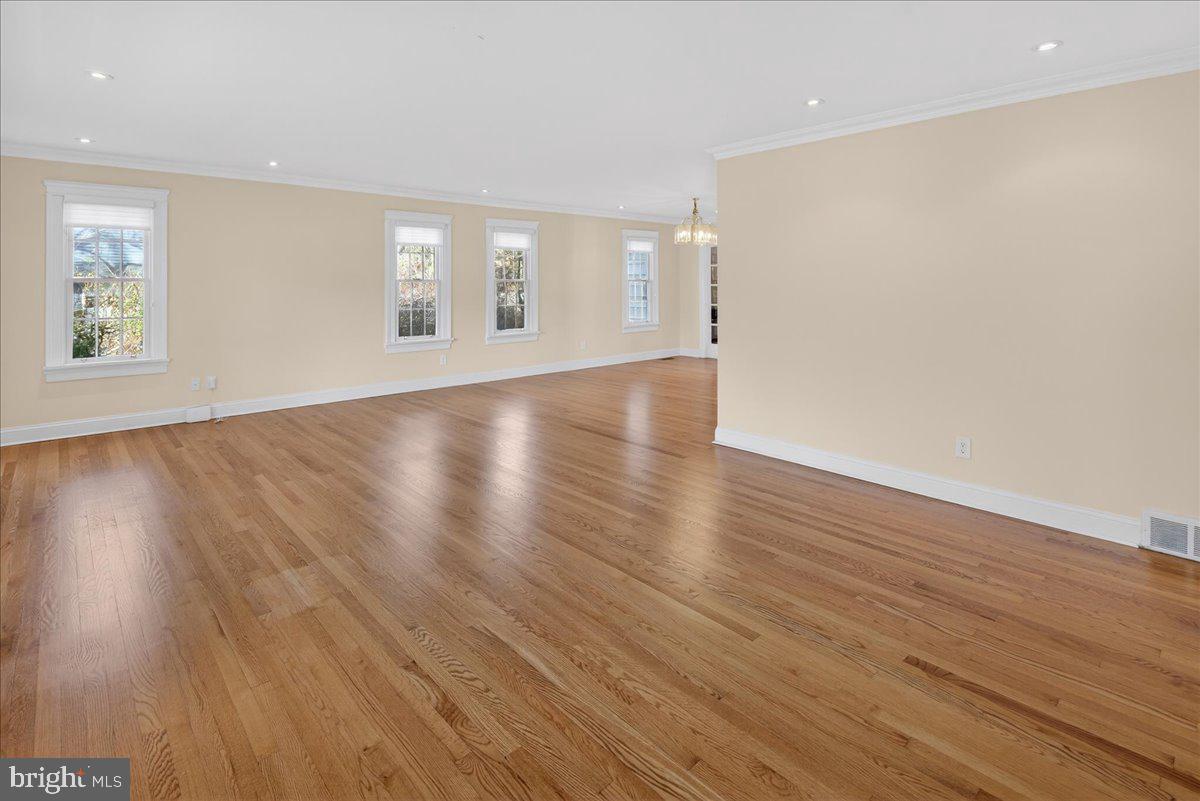 328 Dodds Lane Princeton, NJ 08540 - Photo 18 of 47 an empty room with wooden floor and windows