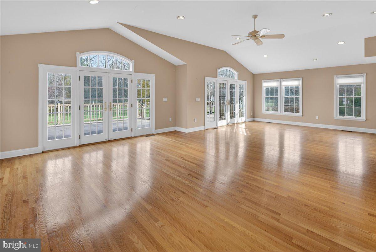328 Dodds Lane Princeton, NJ 08540 - Photo 19 of 47 a view of an empty room with wooden floor and a window