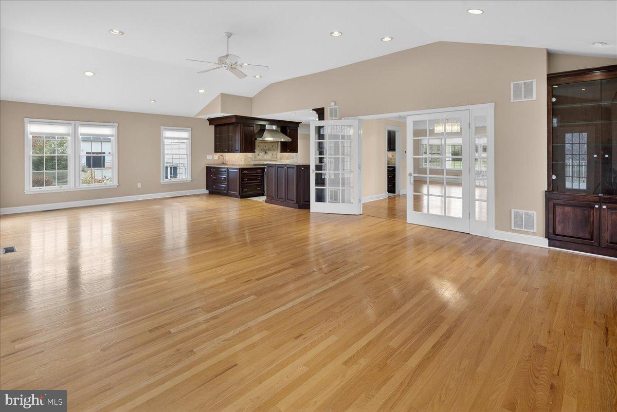 328 Dodds Lane Princeton, NJ 08540 - Photo 20 of 47 an empty room with wooden floor and windows