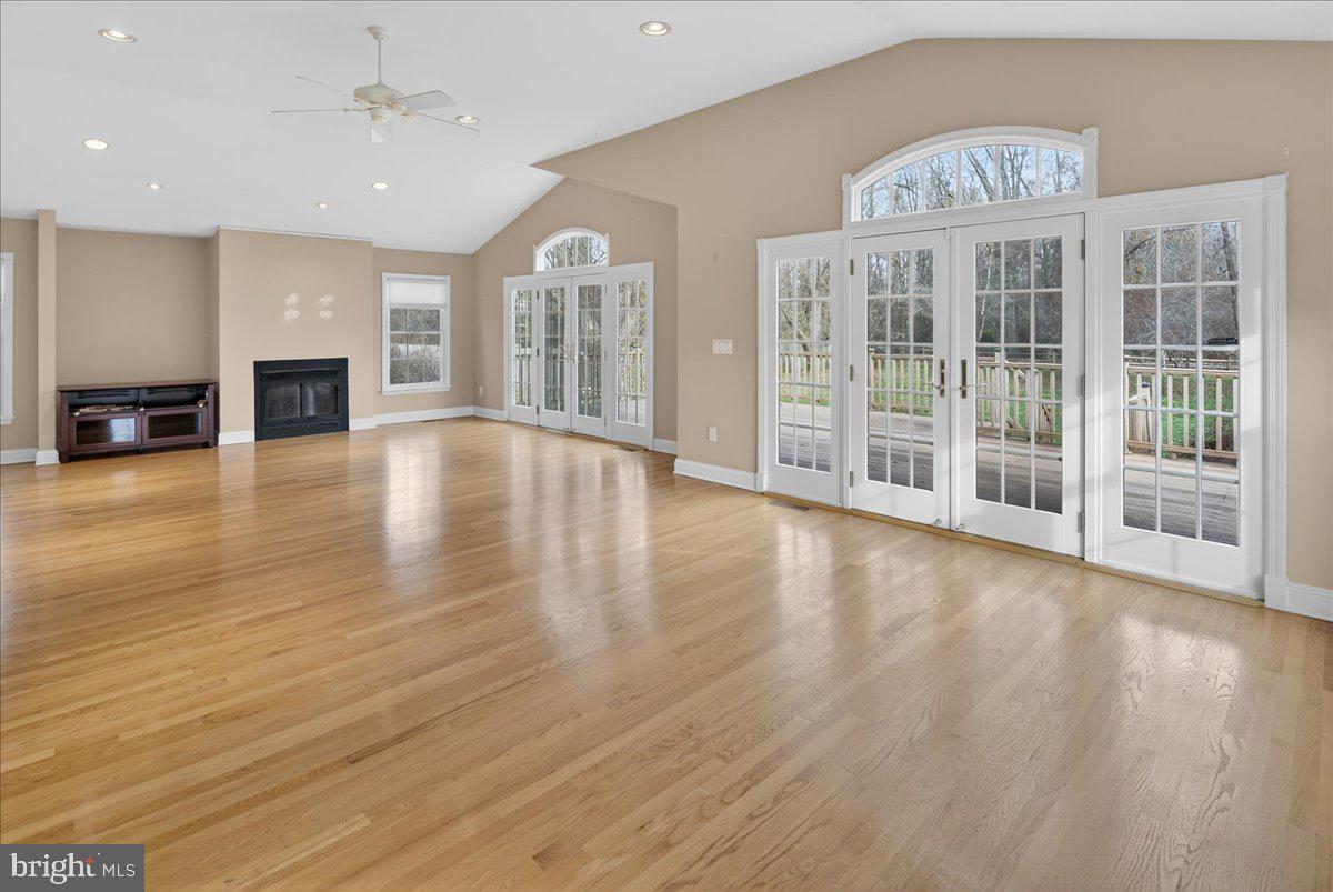 328 Dodds Lane Princeton, NJ 08540 - Photo 21 of 47 a view of an empty room with wooden floor and a fireplace