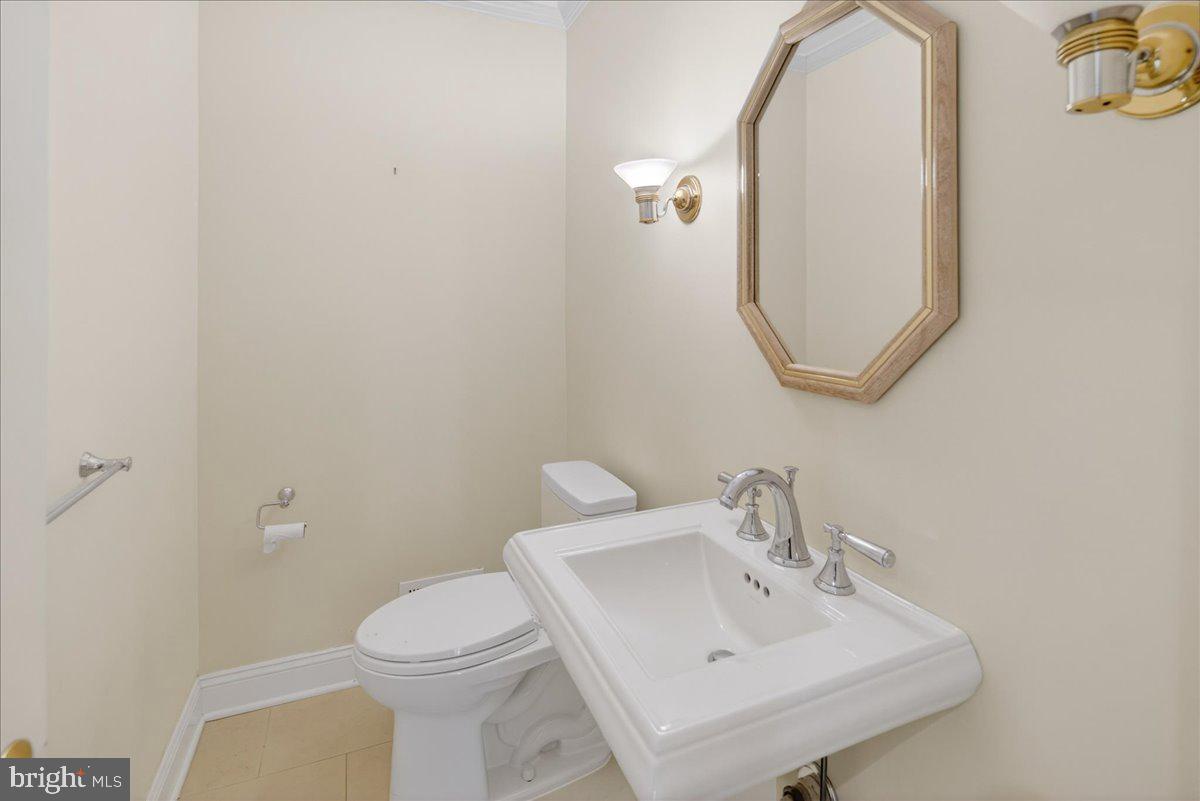 328 Dodds Lane Princeton, NJ 08540 - Photo 26 of 47 a bathroom with a sink a toilet and a mirror
