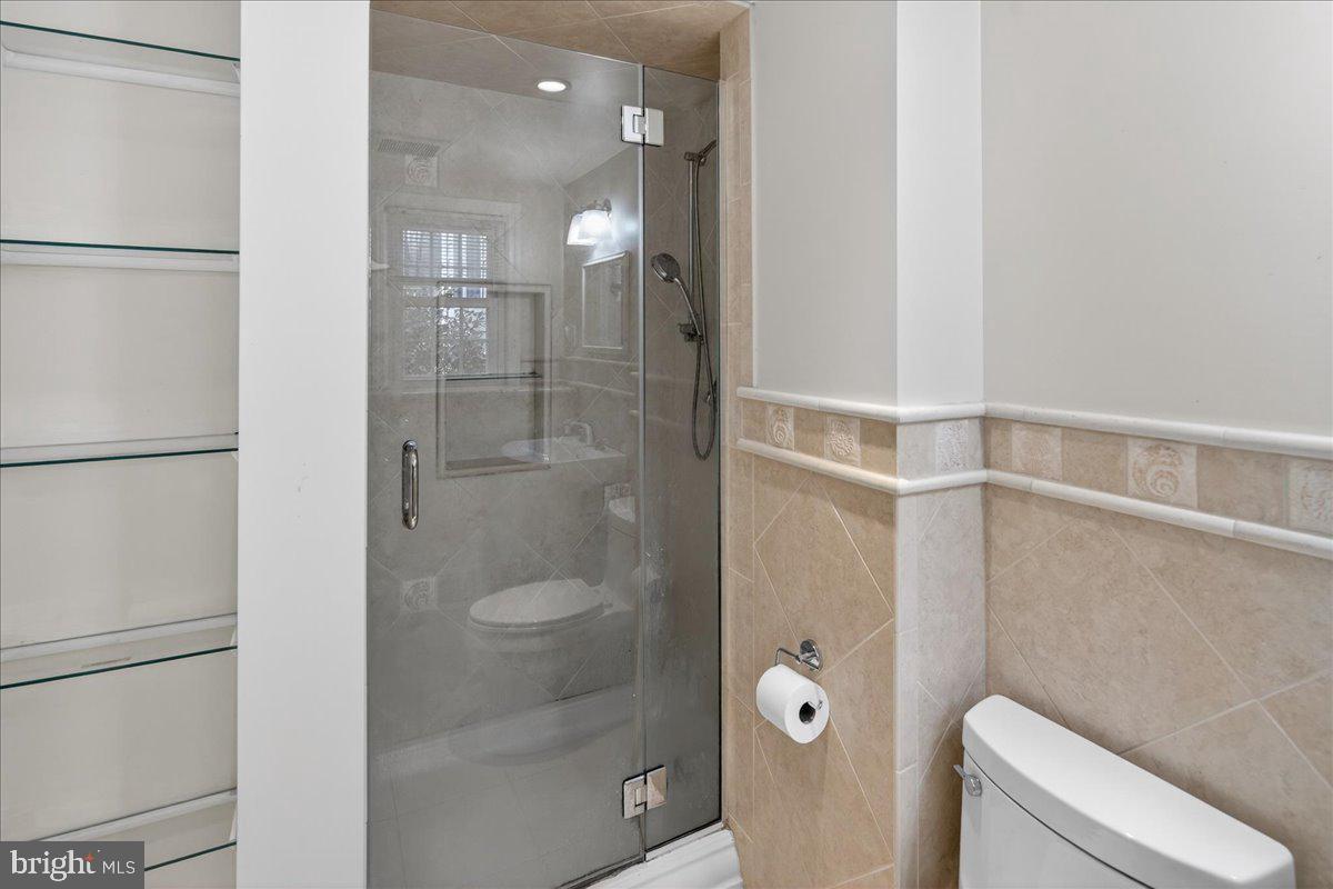 328 Dodds Lane Princeton, NJ 08540 - Photo 31 of 47 a bathroom with a shower and toilet