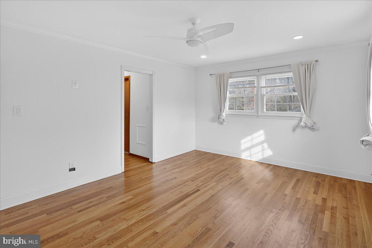 328 Dodds Lane Princeton, NJ 08540 - Photo 33 of 47 an empty room with wooden floor and windows