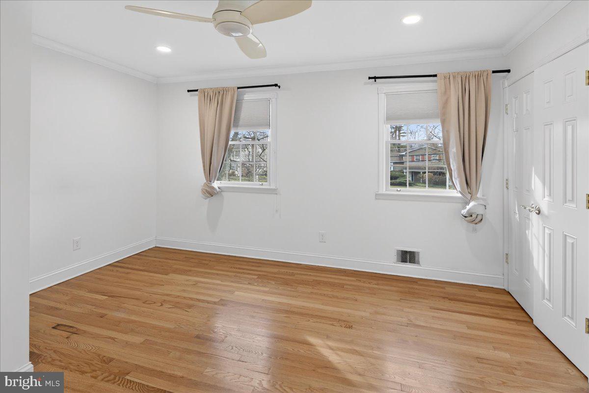 328 Dodds Lane Princeton, NJ 08540 - Photo 42 of 47 a view of an empty room with wooden floor and a window