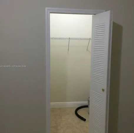 a view of small space with racks on the wall