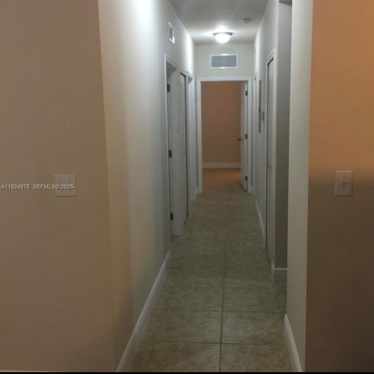 41 West 14th Street, Unit 1 Hialeah, FL 33010 - Photo 6 of 15 a view of a hallway