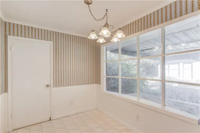 a view of a room with a large window