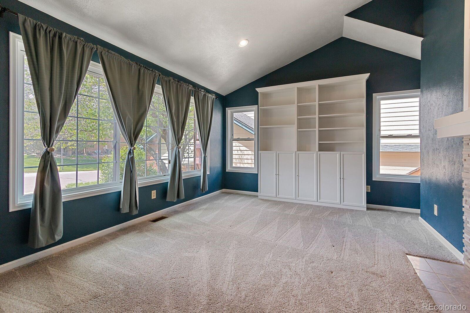 7503 Rattlesnake Drive Lone Tree, CO 80124 - Photo 16 of 29 a view of an empty room with a balcony