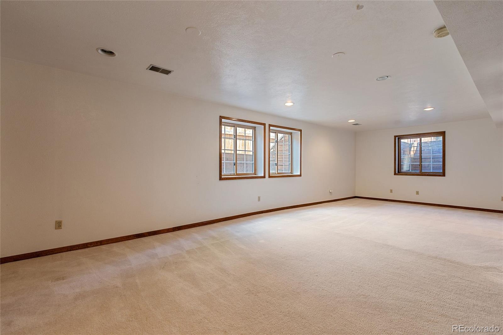 7503 Rattlesnake Drive Lone Tree, CO 80124 - Photo 26 of 29 an empty room with a window