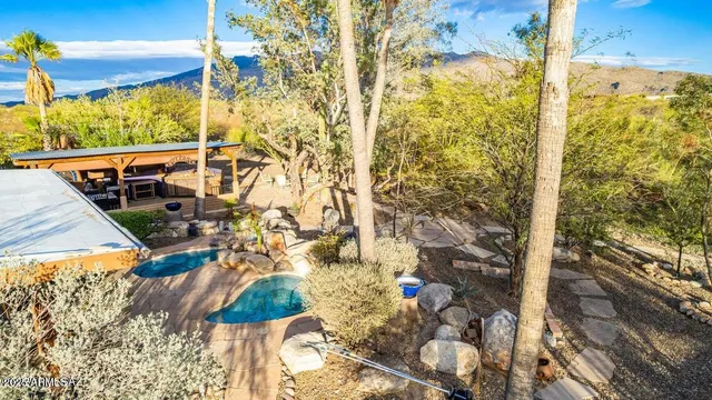 a view of a balcony with next to a yard