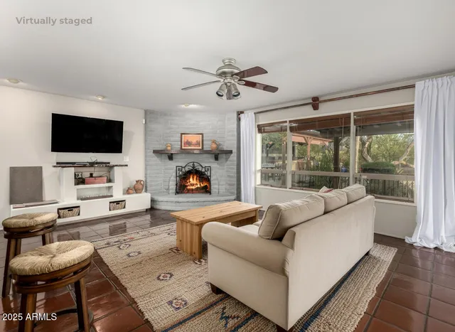a bedroom with a bed and a book shelf
