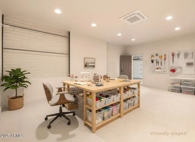 a swimming pool with outdoor seating and plants