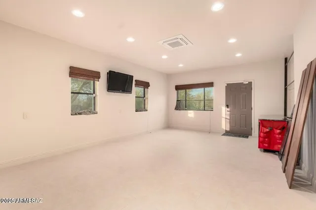 a view of a backyard with sitting area