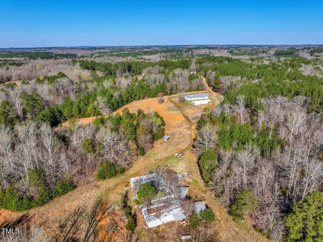 a view of a yard with an ocean