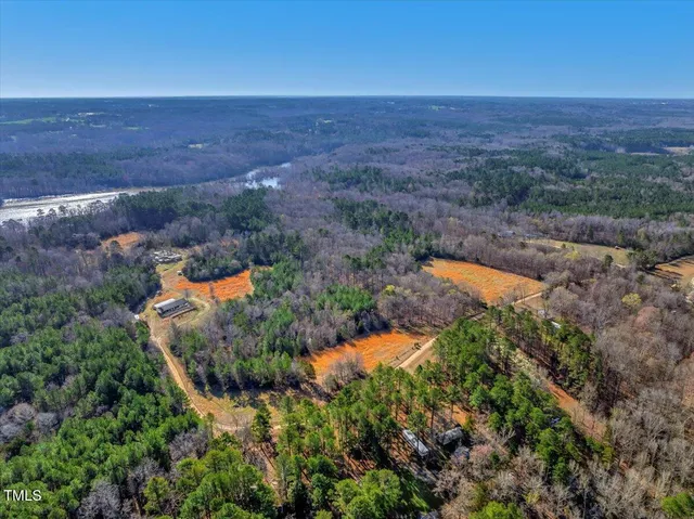 an aerial view of residential house with outdoor space
